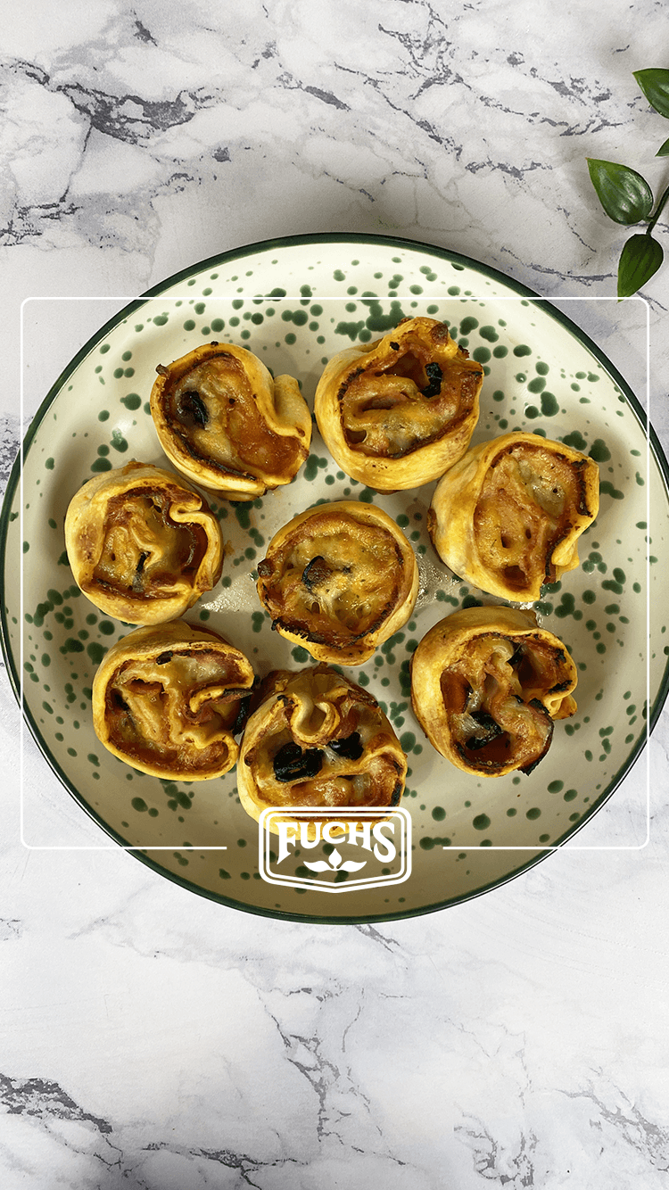 Pizza rolls apéritives en spirale à la mozzarella, sauce tomate et origan lyophilisé Fuchs, dorées au four