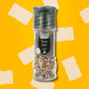 Moulin Fuchs poivre blanc en grains 70g présenté sur fond vert avec motifs de flacons stylisés